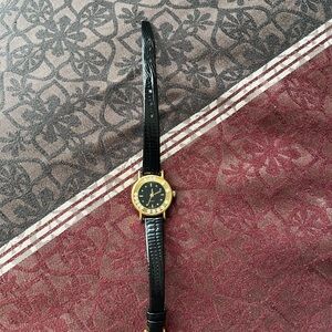 Classic Black and Gold Avon Watch